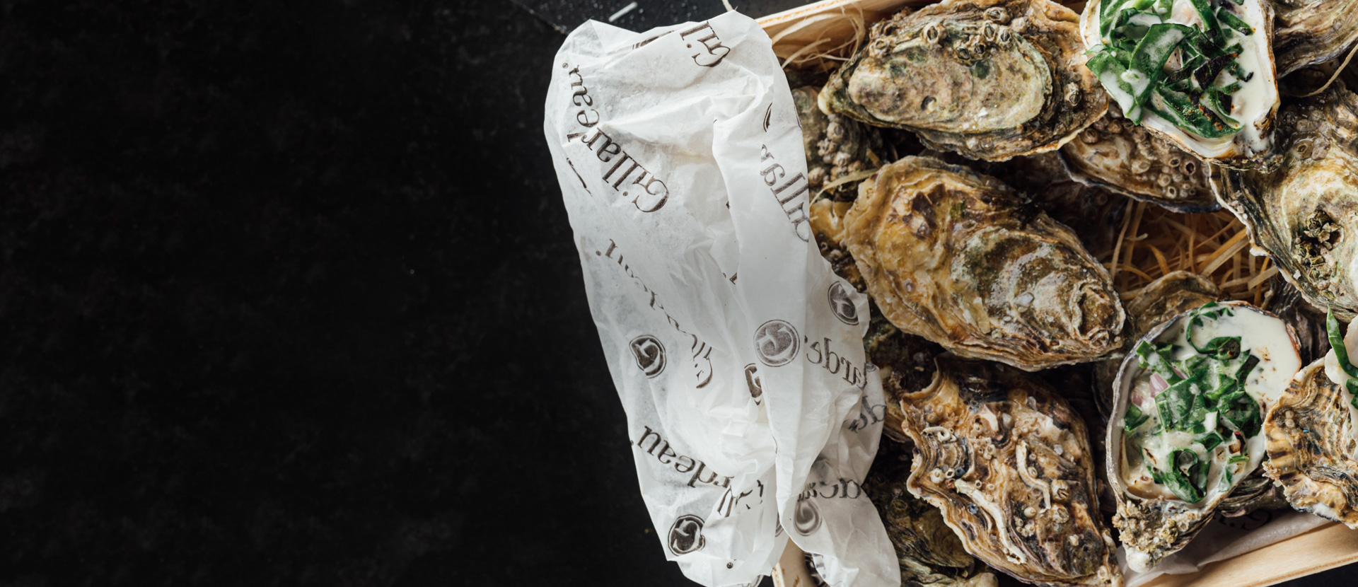 Warm oyster with creamy spinach and parmesan